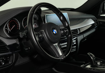 Подержанный автомобиль BMW X6 2018 года (11 фото)