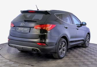 Подержанный автомобиль Hyundai Santa Fe 2014 года (5 фото)