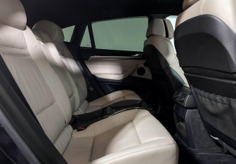 Подержанный автомобиль BMW X6 2013 года (14 фото)