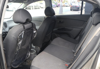 Подержанный автомобиль Kia Rio Hatchback 2010 года (5 фото)