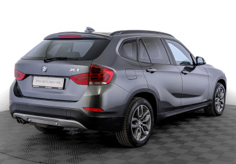 Подержанный автомобиль BMW X1 2014 года (5 фото)
