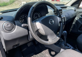 Подержанный автомобиль Nissan Terrano 2015 года (13 фото)