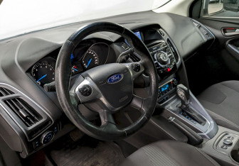 Подержанный автомобиль Ford Focus Wagon 2014 года (13 фото)