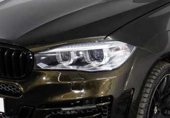 Подержанный автомобиль BMW X6 2015 года (7 фото)