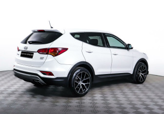 Подержанный автомобиль Hyundai Santa Fe 2015 года (5 фото)