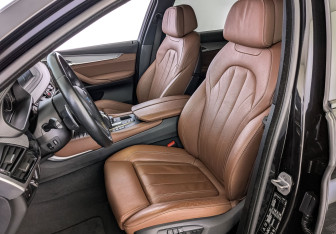 Подержанный автомобиль BMW X6 2018 года (20 фото)