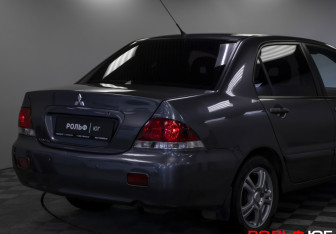 Подержанный автомобиль Mitsubishi Lancer Sedan 2009 года (22 фото)