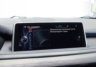 Подержанный автомобиль BMW X5 2015 года (26 фото)