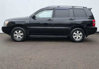 Подержанный автомобиль Toyota Highlander 2003 года (8 фото)