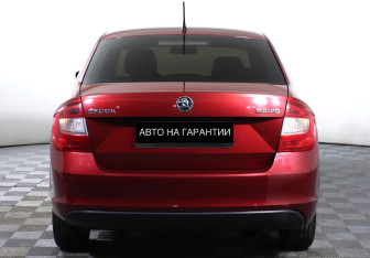 Подержанный автомобиль Skoda Rapid Liftback 2015 года (4 фото)