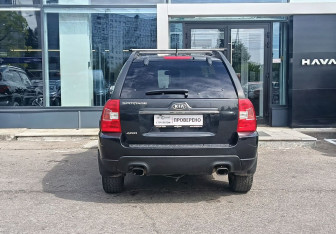 Подержанный автомобиль Kia Sportage 2010 года (6 фото)
