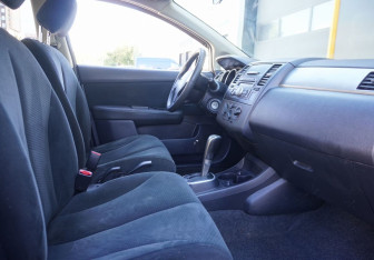 Подержанный автомобиль Nissan Tiida Sedan 2011 года (11 фото)