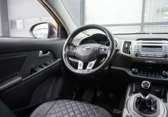 Подержанный автомобиль Kia Sportage 2014 года (13 фото)