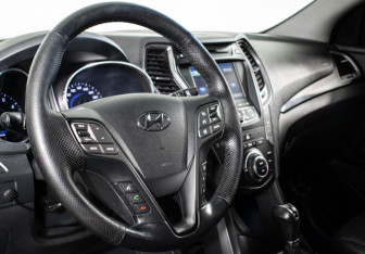 Подержанный автомобиль Hyundai Santa Fe 2015 года (13 фото)