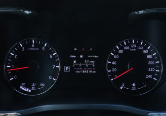 Подержанный автомобиль Kia Cerato Coupe 2013 года (11 фото)