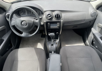 Подержанный автомобиль Nissan Almera Sedan 2013 года (10 фото)
