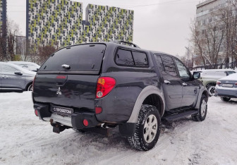 Подержанный автомобиль Mitsubishi L200 2011 года (8 фото)