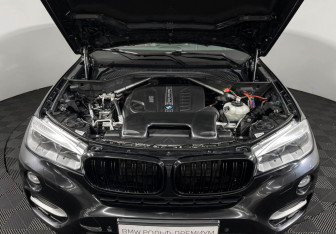 Подержанный автомобиль BMW X6 2016 года (10 фото)