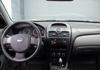Подержанный автомобиль Nissan Almera Classic 2008 года (11 фото)