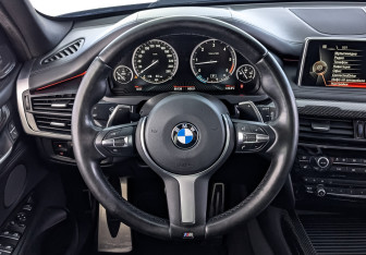 Подержанный автомобиль BMW X5 2015 года (22 фото)