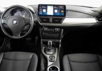 Подержанный автомобиль BMW X1 2014 года (11 фото)