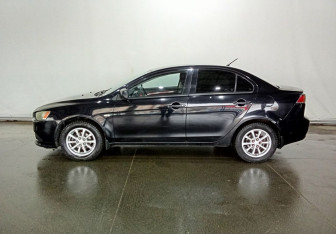 Подержанный автомобиль Mitsubishi Lancer Sedan 2014 года (7 фото)