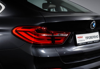 Подержанный автомобиль BMW X4 2014 года (16 фото)