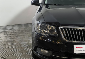 Подержанный автомобиль Skoda Superb Liftback 2013 года (14 фото)