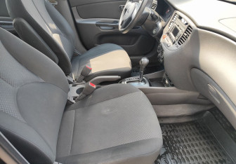 Подержанный автомобиль Kia Rio Sedan 2011 года (9 фото)