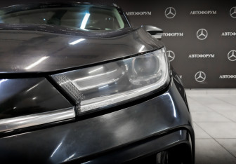 Подержанный автомобиль Exeed TXL 2022 года (17 фото)