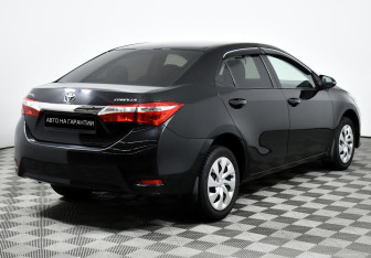 Подержанный автомобиль Toyota Corolla Sedan 2013 года (5 фото)