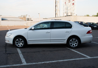 Подержанный автомобиль Skoda Superb Liftback 2012 года (8 фото)