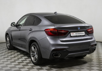 Подержанный автомобиль BMW X6 2018 года (7 фото)
