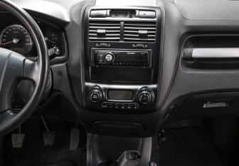 Подержанный автомобиль Kia Sportage 2006 года (15 фото)