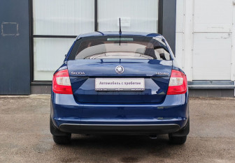 Подержанный автомобиль Skoda Rapid Liftback 2014 года (6 фото)