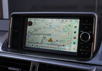 Подержанный автомобиль Toyota iQ 2009 года (14 фото)