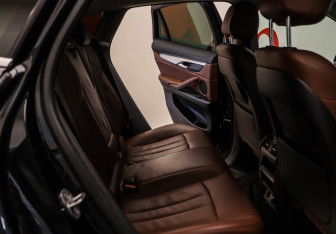 Подержанный автомобиль BMW X6 2016 года (20 фото)