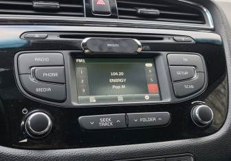 Подержанный автомобиль Kia Ceed Hatchback 2015 года (13 фото)