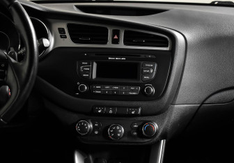 Подержанный автомобиль Kia Ceed Hatchback 2014 года (13 фото)