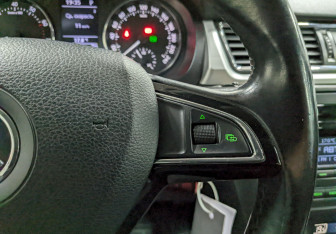 Подержанный автомобиль Skoda Rapid Liftback 2014 года (27 фото)