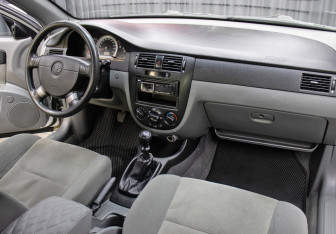Подержанный автомобиль Daewoo Gentra Sedan 2013 года (11 фото)