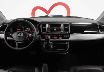 Подержанный автомобиль Volkswagen Multivan 2016 года (8 фото)