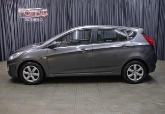Подержанный автомобиль Hyundai Solaris Hatchback 2012 года (8 фото)