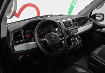 Подержанный автомобиль Volkswagen Multivan 2016 года (7 фото)