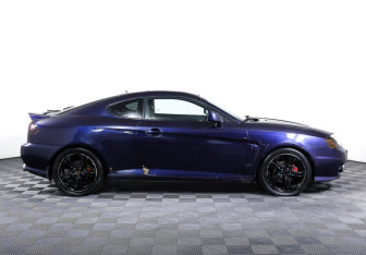 Подержанный автомобиль Hyundai Coupe 2002 года (4 фото)