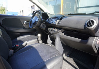 Подержанный автомобиль Nissan Note 2013 года (11 фото)