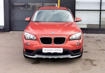 Подержанный автомобиль BMW X1 2014 года (2 фото)