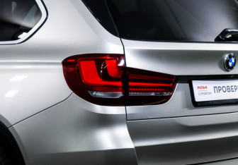 Подержанный автомобиль BMW X5 2015 года (16 фото)