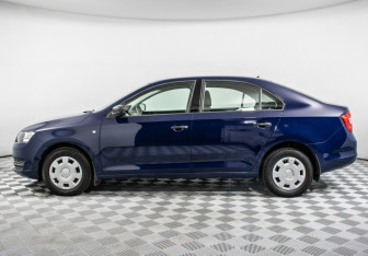 Подержанный автомобиль Skoda Rapid Liftback 2015 года (8 фото)
