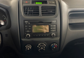 Подержанный автомобиль Kia Sportage 2009 года (13 фото)